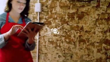 Tablet kullanan Kafkas kadın fırıncı üzerinden bağlantı ağının animasyonu. Küresel iş, yiyecek ve dijital arayüz kavramı, dijital olarak üretilen video.