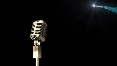 Koyu arkaplanda parlayan mavi ışık lekeleri üzerinde fotokopi alanı olan retro mikrofon animasyonu. Klasik müzik, eğlence ve renk konsepti dijital olarak oluşturulmuş video.