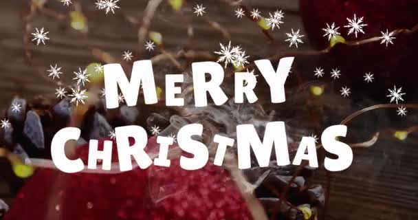 Animatie Van Sneeuwvlokken Vallen Vrolijke Kersttekst Tegen Close Van Kerstversieringen — Stockvideo
