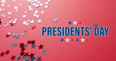 Amerika Birleşik Devletleri yıldızlarının kırmızı arka planda başkanlık günü metninin animasyonu. Amerikan bağımsızlığı, gelenek ve kutlama konsepti dijital olarak oluşturulmuş video.