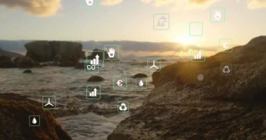 Kayalara ve denize karşı yüzen yeşil enerji konsepti simgelerinin animasyonu. Yenilenebilir enerji ve ekoloji kavramı