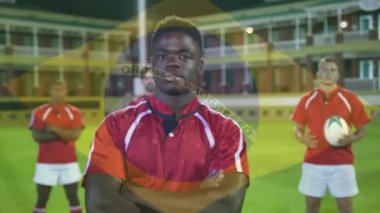 Stadyumda top oynayan çeşitli erkek ragbi oyuncuları üzerinde Brezilya bayrağı animasyonu. Küresel spor ve vatanseverlik kavramı, dijital olarak üretilen video.