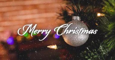 Yılbaşı süslemeleriyle yağan karla ilgili mutlu noel mesajlarının animasyonu. Noel, şenlik, kutlama ve gelenek konsepti dijital olarak oluşturuldu.