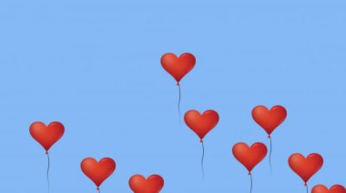 Kırmızı parçacıkların ve kırmızı kalbin animasyonu mavi arka planda yüzen balonları şekillendirir. Sevgililer Günü ve Parti Kutlama Konsepti