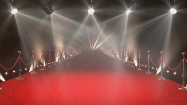 Parlayan spot ışıkları ve kırmızı halı arka planının animasyonu. Parti, yeni yıl ve dijital olarak üretilen video konsepti.