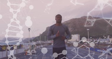 Gezintide koşan Afrikalı Amerikalı bir adamın üzerindeki DNA ve şekillerin görüntüsü. sağlık ve zindelik kavramı dijital olarak oluşturulmuş görüntü.