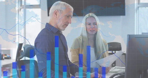 Image of digital interface showing world\'s map and statistics with diverse colleagues working together in an office. digital interface and global business, digitally generated image