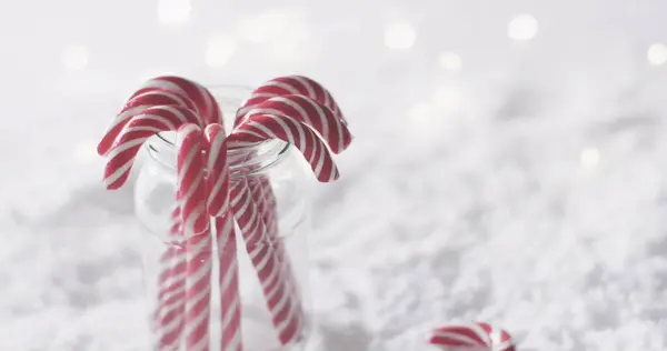 Candy Canes Jar Set Snowy Backdrop Copy Space Perfect Conveying — Stock Photo, Image