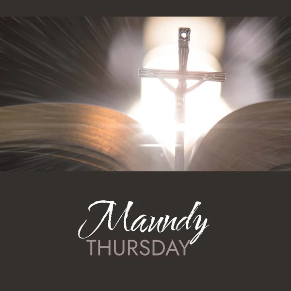 Composition of maundy thursday text over cross with holy bible and light trails. Maundy thursday tradition and religion concept digitally generated image.