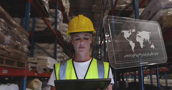Image of data processing on screen over caucasian woman working in warehouse. Global shipping, networks, computing and data processing concept digitally generated image.
