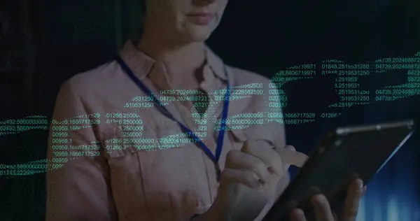 Image of digital chain over caucasian woman using tablet in server room. Cloud computing, digital interface and security concept digitally generated image.