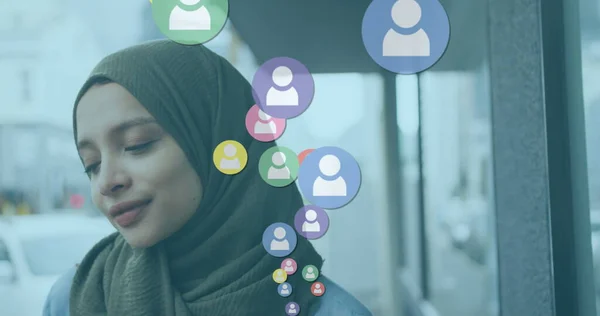 Image Colourful People Icons Floating Smiling Woman Hijab Walking City — Stock Photo, Image