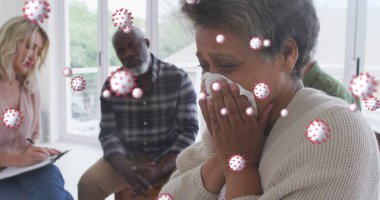 Çeşitli yaşlılar grubunun konuştuğu virüs hücrelerinin görüntüsü. 