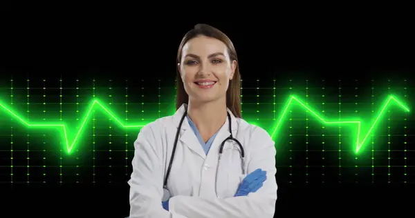 Image of life line over female caucasian doctor on black background. Global medicine, technology, data processing and digital interface concept digitally generated image.