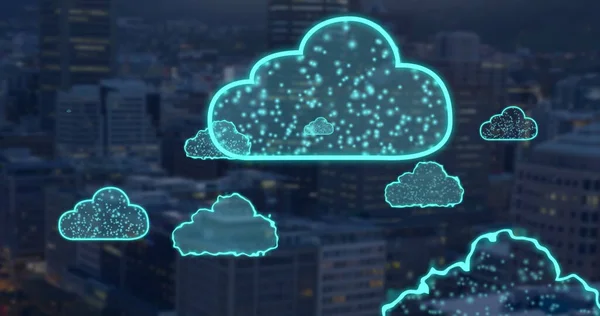 Image of digital clouds flying over cityscape. Global cloud computing, connections and data processing concept digitally generated image.