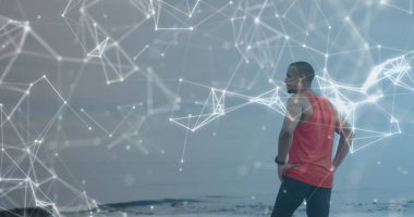 Spor yaparken dinlenen bir erkek sporcunun üzerinden geçen iletişim ağı görüntüsü. spor, başarı ve iletişim teknolojisi konsepti, dijital olarak üretilen görüntü.