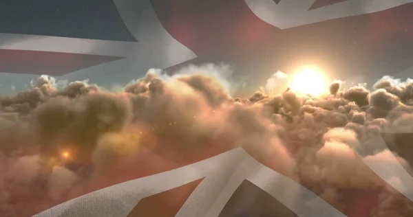 Dramatic Sky Clouds Sunburst Overlays Faded Union Jack Flag Symbolizing — Stock Photo, Image