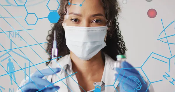 Image of chemical structures over biracial female doctor with vaccine and vial. Global medicine and digital interface concept digitally generated image.