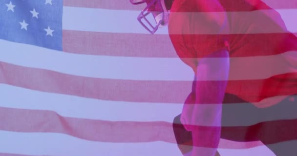 アメリカンフットボール選手のひざまずきと国旗のアニメーション アメリカの愛国心 スポーツ 競技コンセプト デジタル生成ビデオ — ストック動画