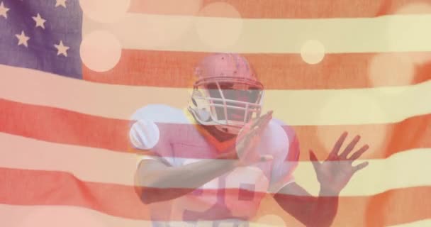 Animation Afrikansk Amerikansk Fotbollsspelare Och Flagga Usa Amerikansk Patriotism Sport — Stockvideo