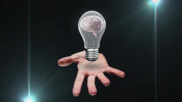 Animation Einer Glühbirne Mit Hand Und Gehirn Über Lichtflecken Globale — Stockvideo