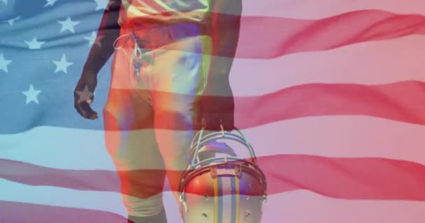 Animation Afrikansk Amerikansk Fodboldspiller Med Hjelm Flag Usa Amerikansk Patriotisme – Stock-video