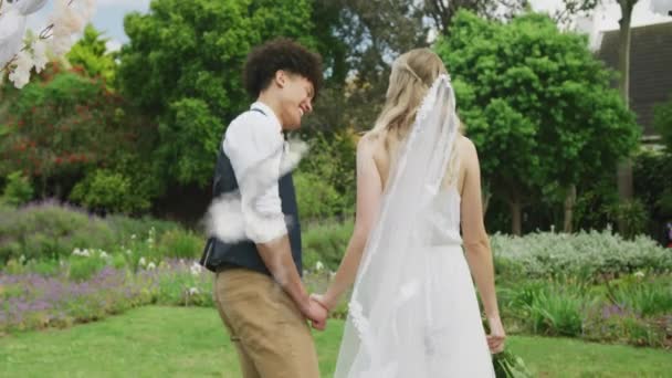 Animation Cloud House Happy Diverse Couple Walking Garden Wedding Day — Stock Video