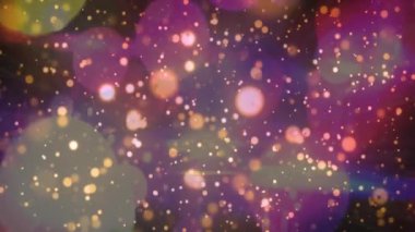 Koyu arkaplanda kusursuz döngü üzerinde hareket eden parlak ışık noktalarının animasyonu. Işık, şekil, şekil, renk ve hareket konsepti dijital olarak oluşturulmuş video.