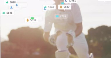 Kafkas erkek kriket oyuncusu üzerinde ikon ve veri işleme animasyonları. Küresel spor, sosyal medya, bağlantılar, hesaplama ve veri işleme kavramı dijital olarak oluşturulmuş video.