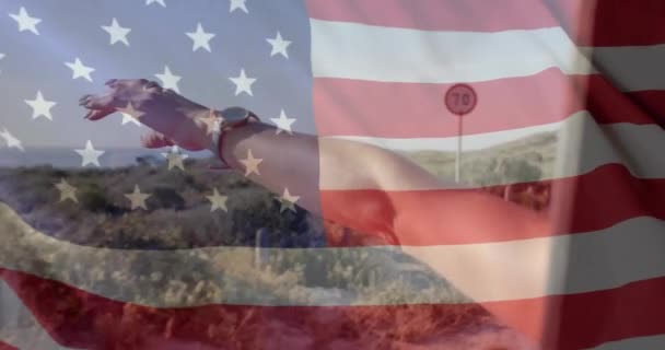 Animación Bandera Sobre Brazo Mujer Caucásica Sentada Coche Patriotismo Concepto — Vídeo de stock