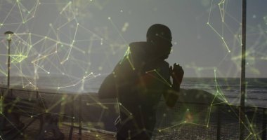 Kaçan bir Afro-Amerikan 'la bağlantılı bir ağ görüntüsü. Küresel bağlantılar, refah, zindelik ve sağlıklı yaşam tarzı konsepti dijital olarak oluşturuldu.