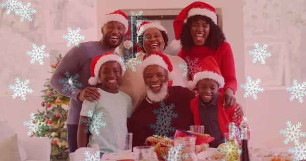 Image Snow Falling Smiling Family Santa Hats Embracing Christmas Winter — Stock Photo, Image
