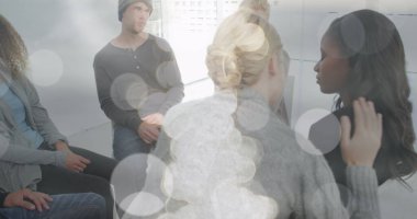 Image of light spots over diverse people participating in group therapy. Mental health, therapy and healthcare concept digitally generated image. clipart