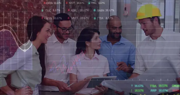 Image of graphs and trading boards over diverse engineer explaining blueprint to coworkers. Digital composite, multiple exposure, stock market, report, business and technology concept.
