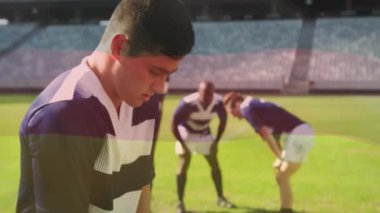 Yorgun Kafkas ragbi oyuncusu ve takım arkadaşları sahada Alman bayrağının animasyonu. Almanca, milliyet, takım, hazırlık, spor ve yarışma, dijital olarak oluşturulmuş video.