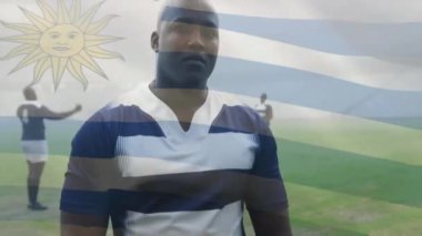 Çeşitli ragbi oyuncuları üzerinde uruguay bayrağı animasyonu. Küresel spor, rekabet, bilgisayar ve veri işleme kavramı dijital olarak oluşturulmuş video.