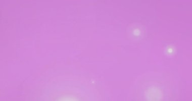 Pembe arka planda parlayan beyaz ışık lekelerinin animasyonu. Bağlantı, işleme, veri, enerji, ışık ve iletişim, dijital olarak oluşturulmuş video.