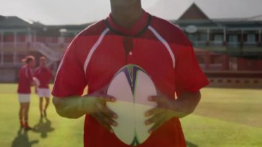 Çeşitli erkek rugby oyuncuları üzerinde Alman bayrağının animasyonu. Küresel spor, vatanseverlik ve dijital arayüz kavramı dijital olarak üretilen video.