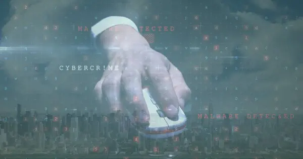 Image of cyber attack warning with hand holding computer mouse over cityscape. Global technology, online security and digital interface concept digitally generated image.