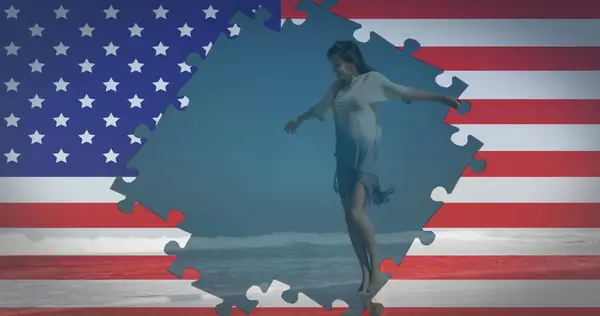 Image American Flag Waving Jigsaw Puzzles Revealing Woman Dancing Beach — Stock Photo, Image