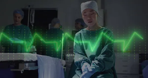 Bild Kardiografi Över Asiatisk Kvinnlig Kirurg Bär Medicinska Handskar Sjukhus — Stockfoto