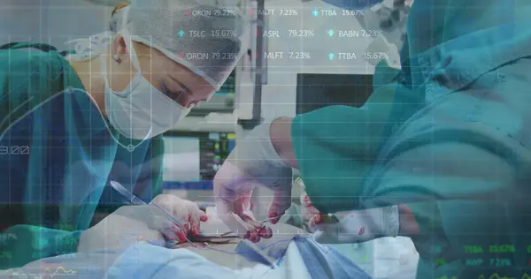 Stock Market Data Processing Male Female Surgeons Performing Operation Hospital — Zdjęcie stockowe