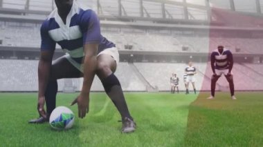 İtalyan bayrağının sahadaki çeşitli ragbi oyuncularına karşı animasyonu. Küresel spor, rekabet, bilgisayar ve veri işleme kavramı dijital olarak oluşturulmuş video.
