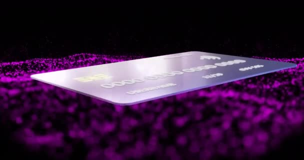 黒い背景に紫色のスポット上のクレジットカードのアニメーション ファイナンス ビジネス コンピューティング デジタルインターフェースのコンセプトがデジタル生成されたビデオ — ストック動画
