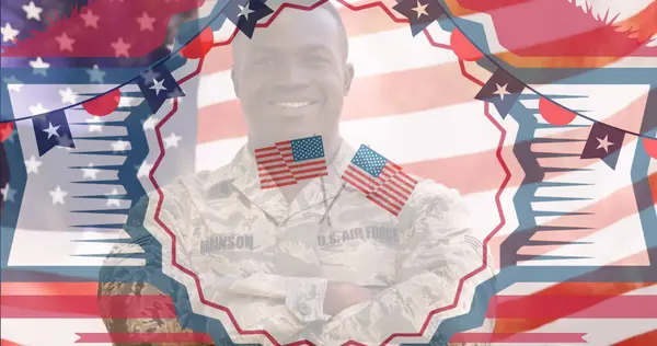 American independence decorative banner against african american soldier in uniform smiling. american independence and celebration concept