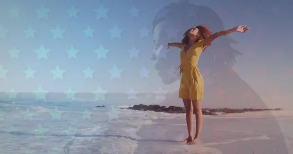 Multiple star icons against african american woman enjoying on the beach. Travel and vacation concept