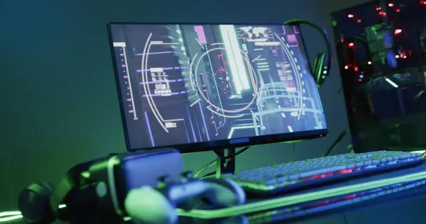 Gaming Setup Vibrant Screen Graphics Featuring Peripherals Illuminated Keyboard Headset — Stock Photo, Image