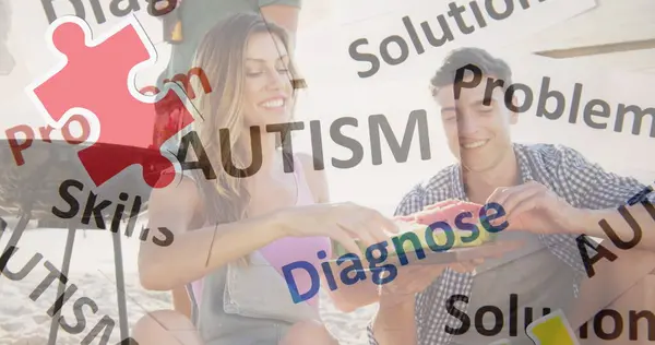 Image of colourful puzzle pieces and autism text over happy friends at summer beach party. autism, learning difficulties, support and awareness concept digitally generated image.
