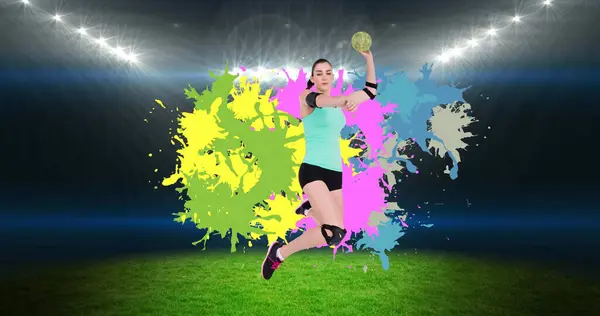 Image of caucasian female handball player holding ball over empty stadium. sports and competition concept digitally generated image.
