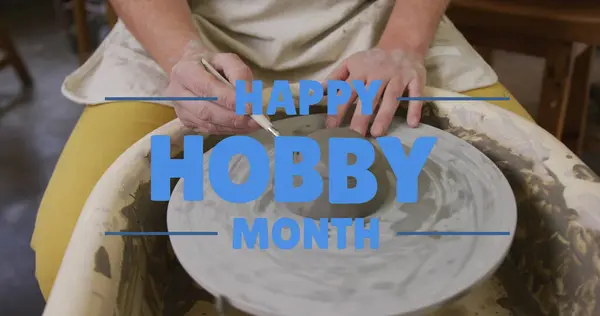 Image of happy hobby month text over caucasian man forming pottery. hobby and celebration concept digitally generated image.
